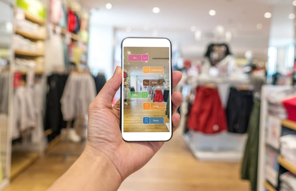 Augmented reality app for marketing . Hand holding smart phone use AR application to check information
