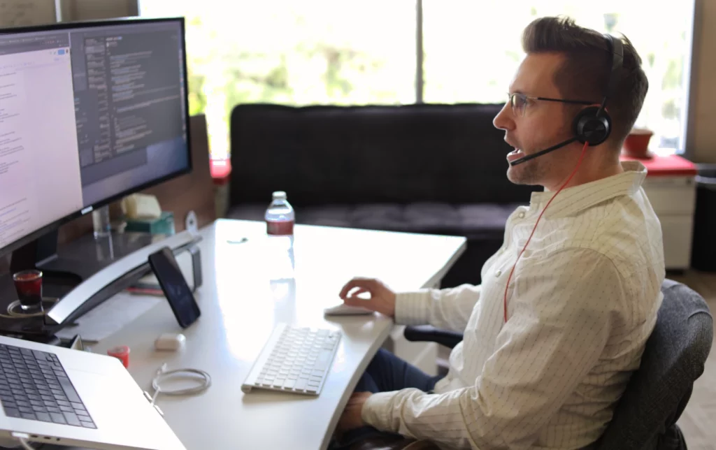 Saritasa employee providing software support over zoom call